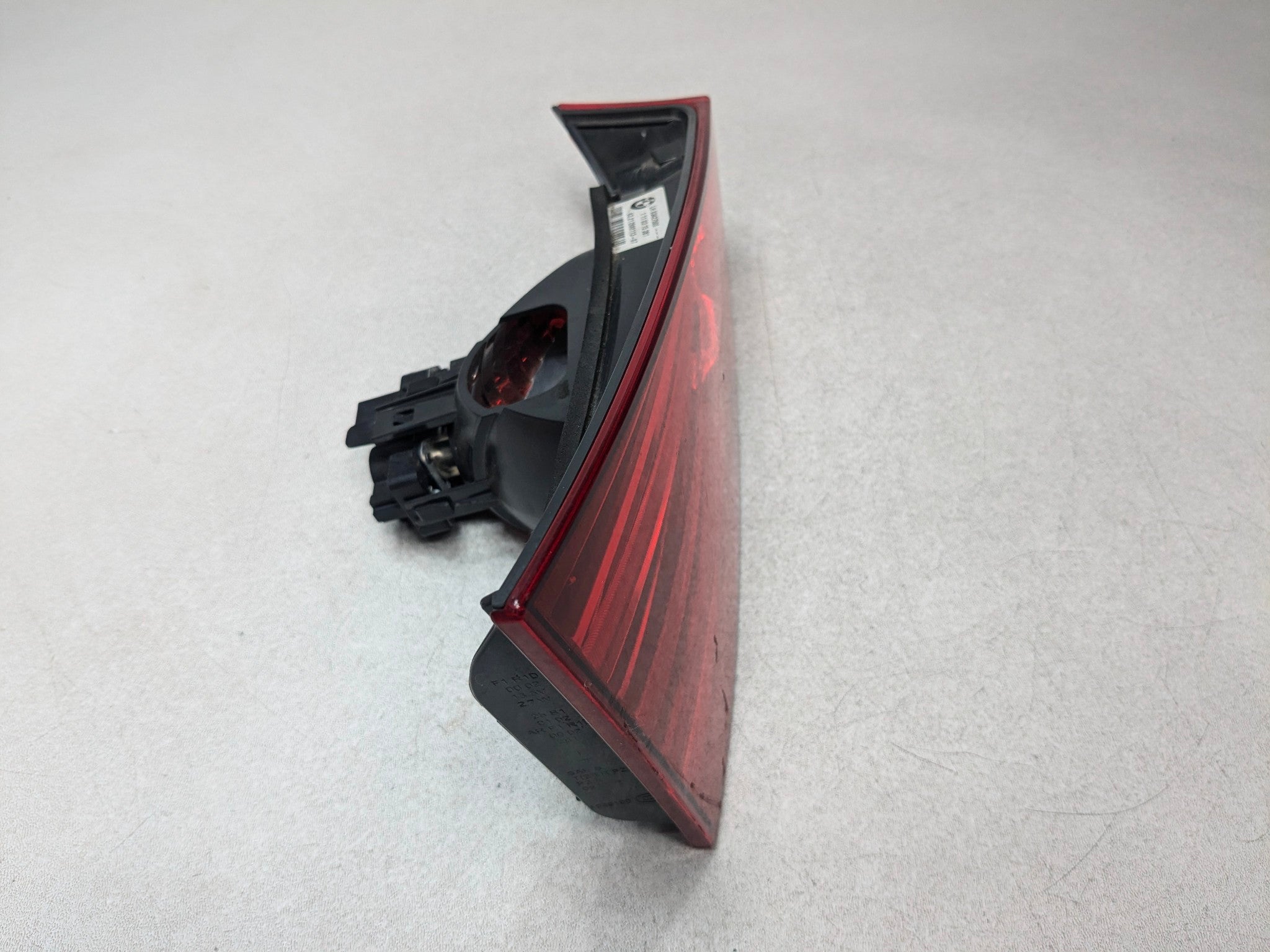 2013 - 2015 BMW X1 OEM INNER TAIL LIGHT ASSEMBLY GATE MOUNTED REAR LEFT SIDE
