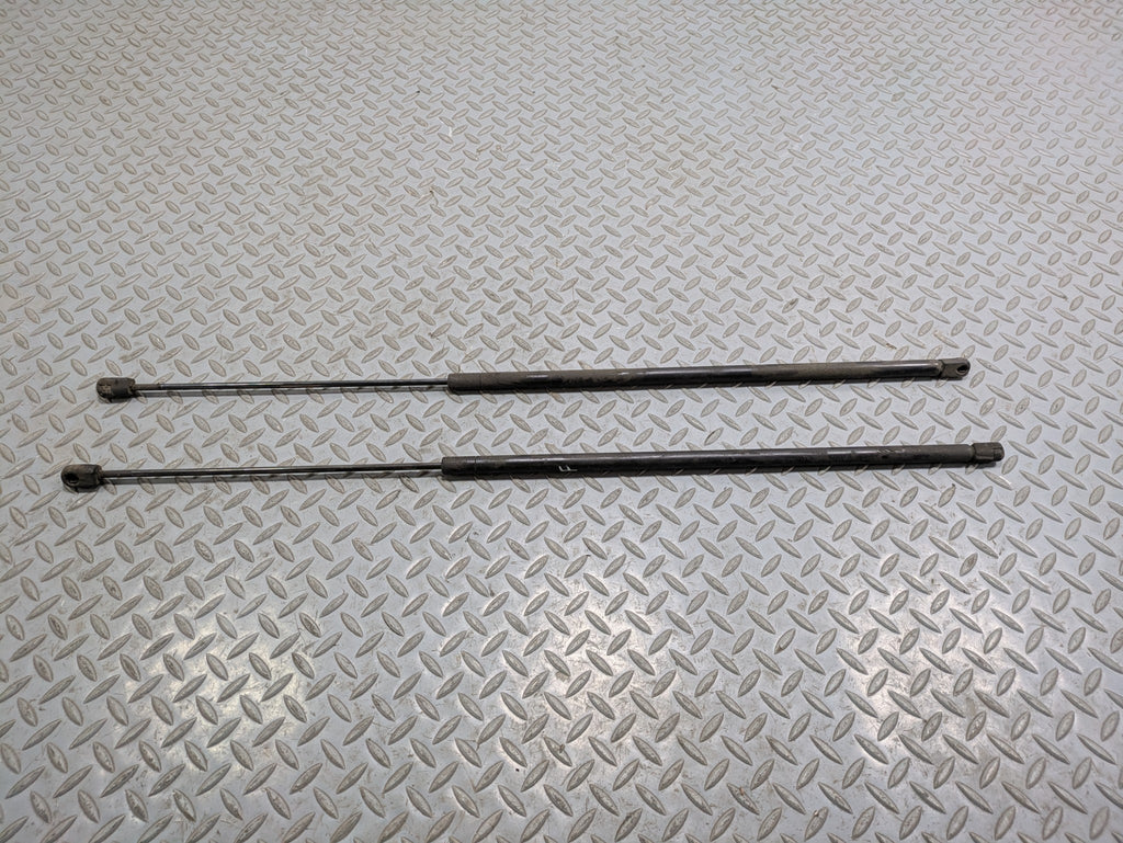 2000 - 2005 CADILLAC DEVILLE OEM HOOD BONNET SHOCK STRUT SUPPORT LEFT AND RIGHT