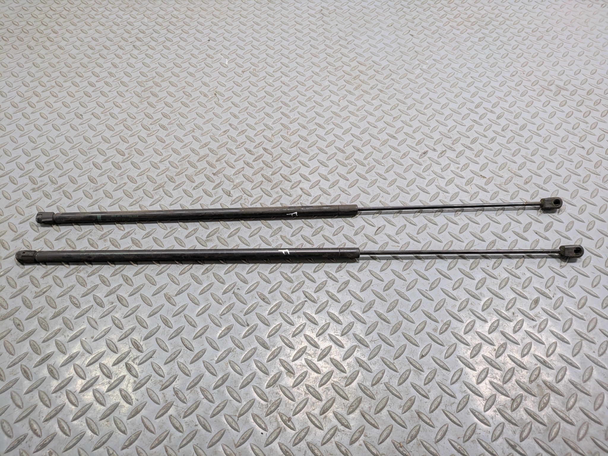 2000 - 2005 CADILLAC DEVILLE OEM HOOD BONNET SHOCK STRUT SUPPORT LEFT AND RIGHT