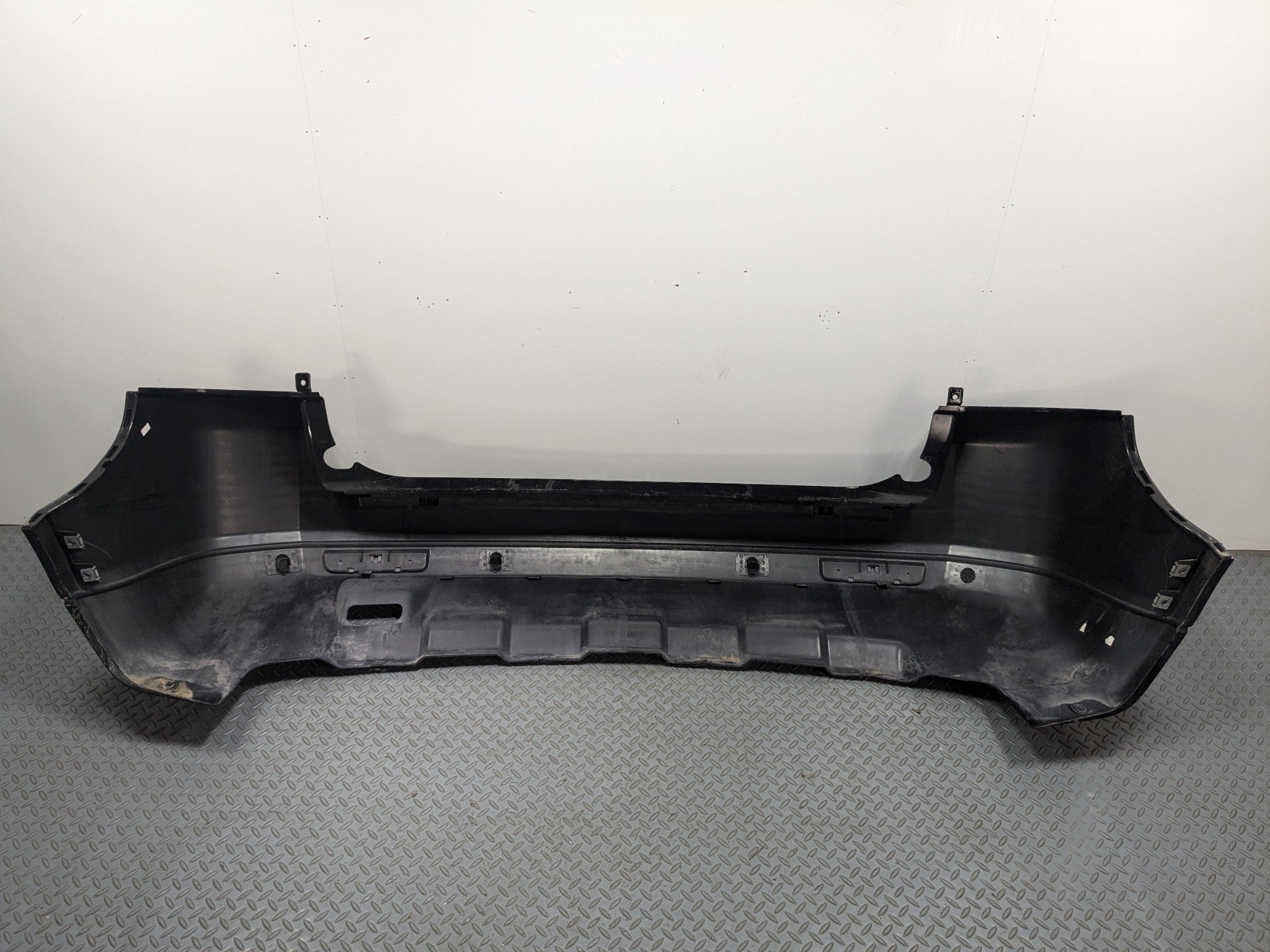2008 - 2015 LAND ROVER LR2 OEM REAR BUMPER LOWER COVER PANEL SANTORINI BLACK