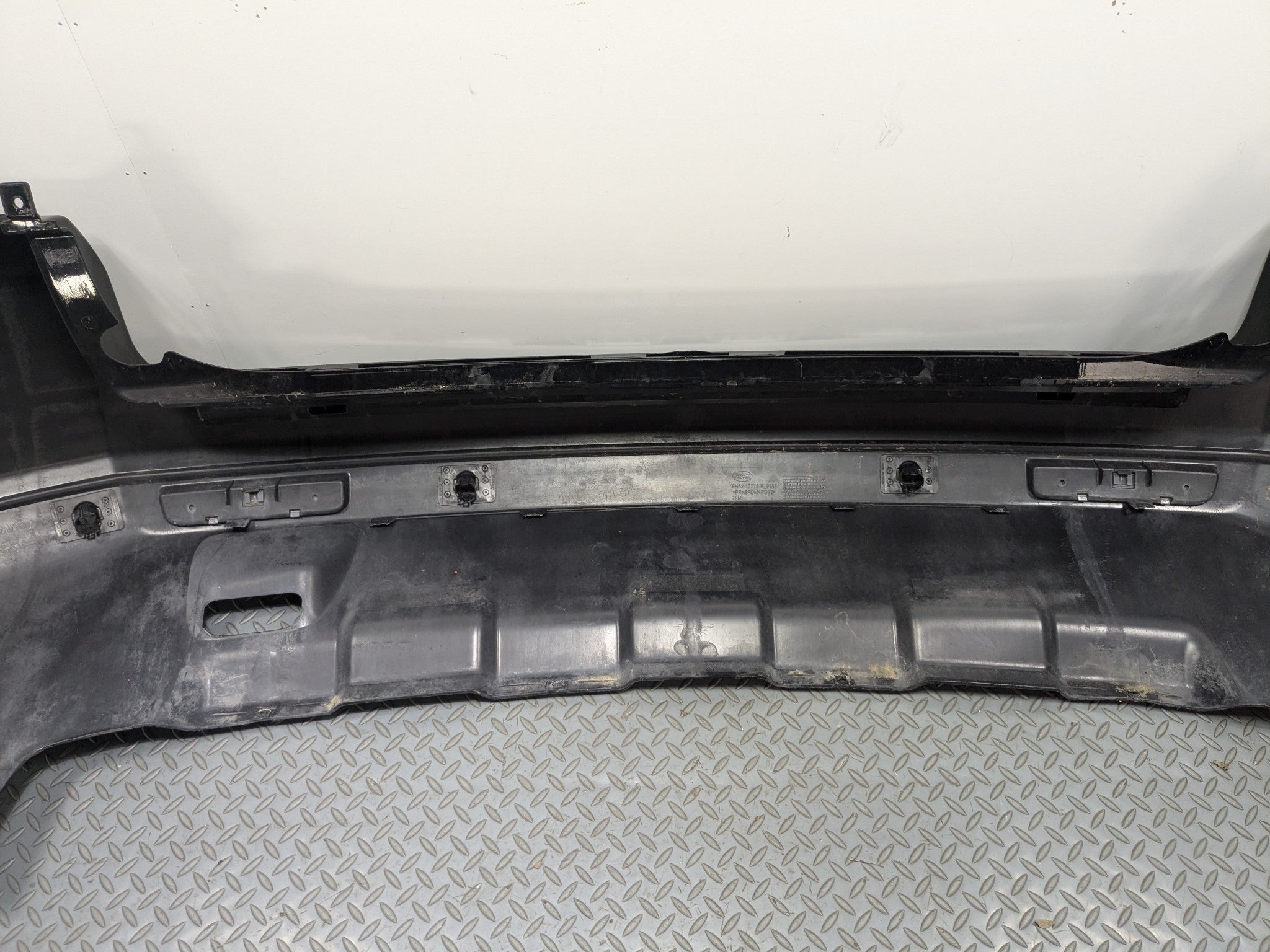 2008 - 2015 LAND ROVER LR2 OEM REAR BUMPER LOWER COVER PANEL SANTORINI BLACK