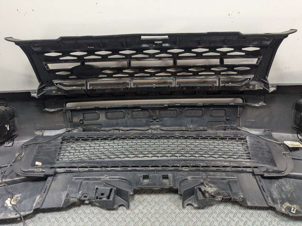 2008 - 2015 LAND ROVER LR2 OEM FRONT BUMPER COVER ASSEMBLY WITH GRILL GRILLE