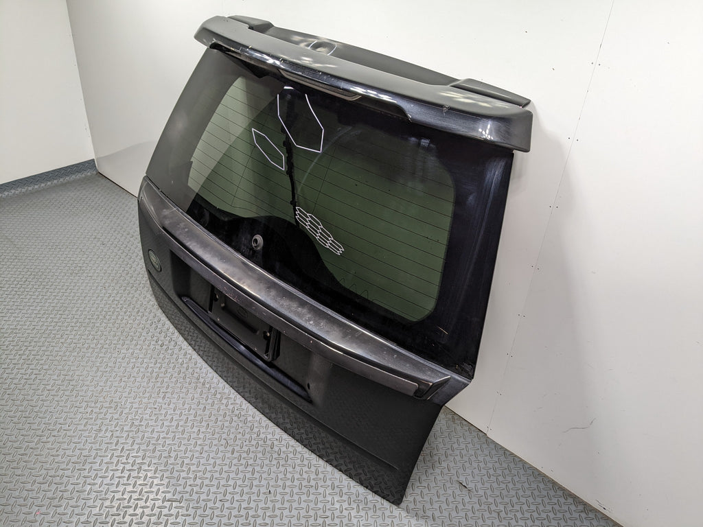 2008 - 2015 LAND ROVER LR2 OEM REAR LIFTGATE SHELL PANEL WITH GLASS AND SPOILER