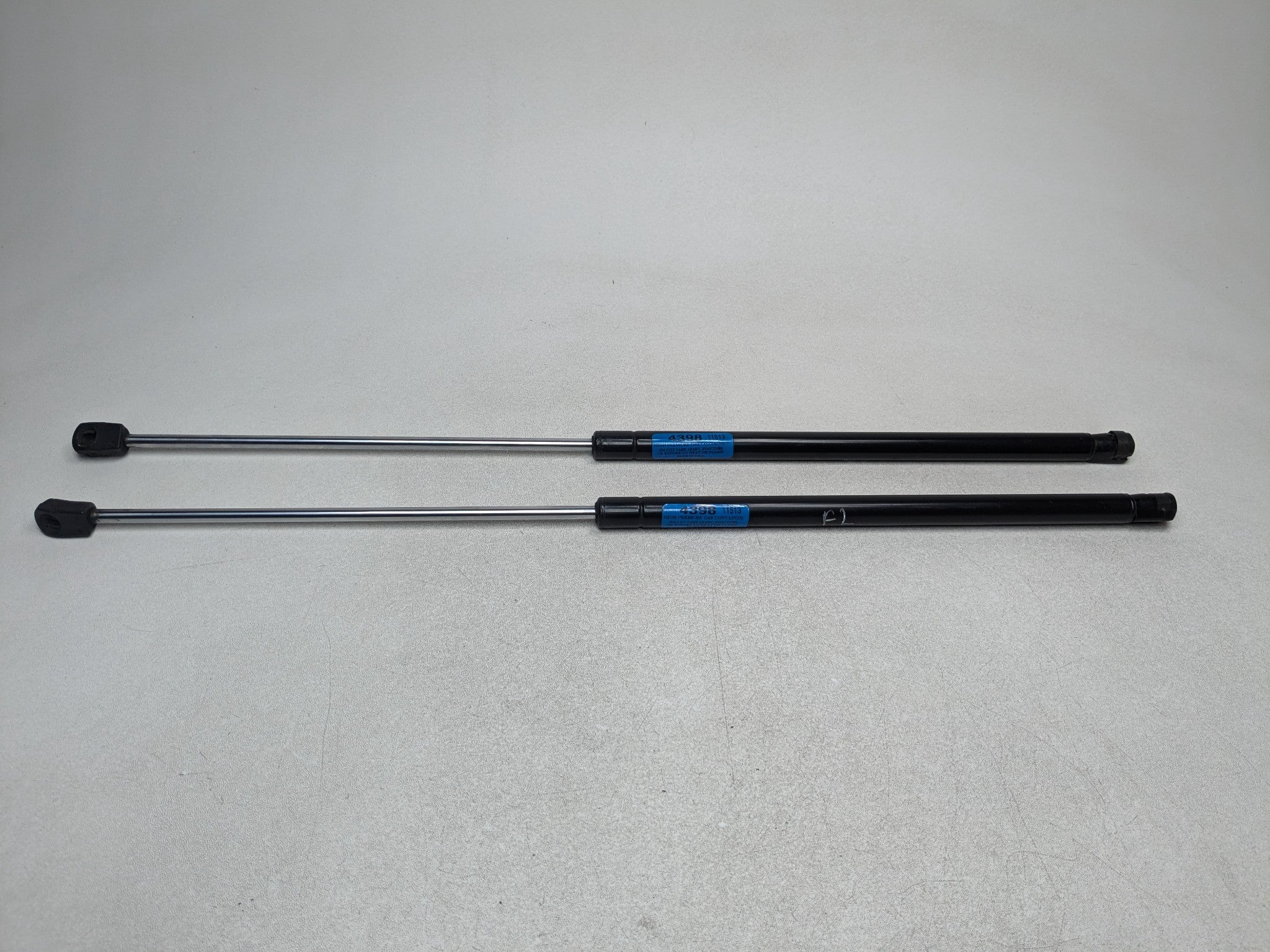 2004 - 2009 CADILLAC SRX OEM HOOD SHOCK STRUT SET OF TWO FRONT LEFT AND RIGHT