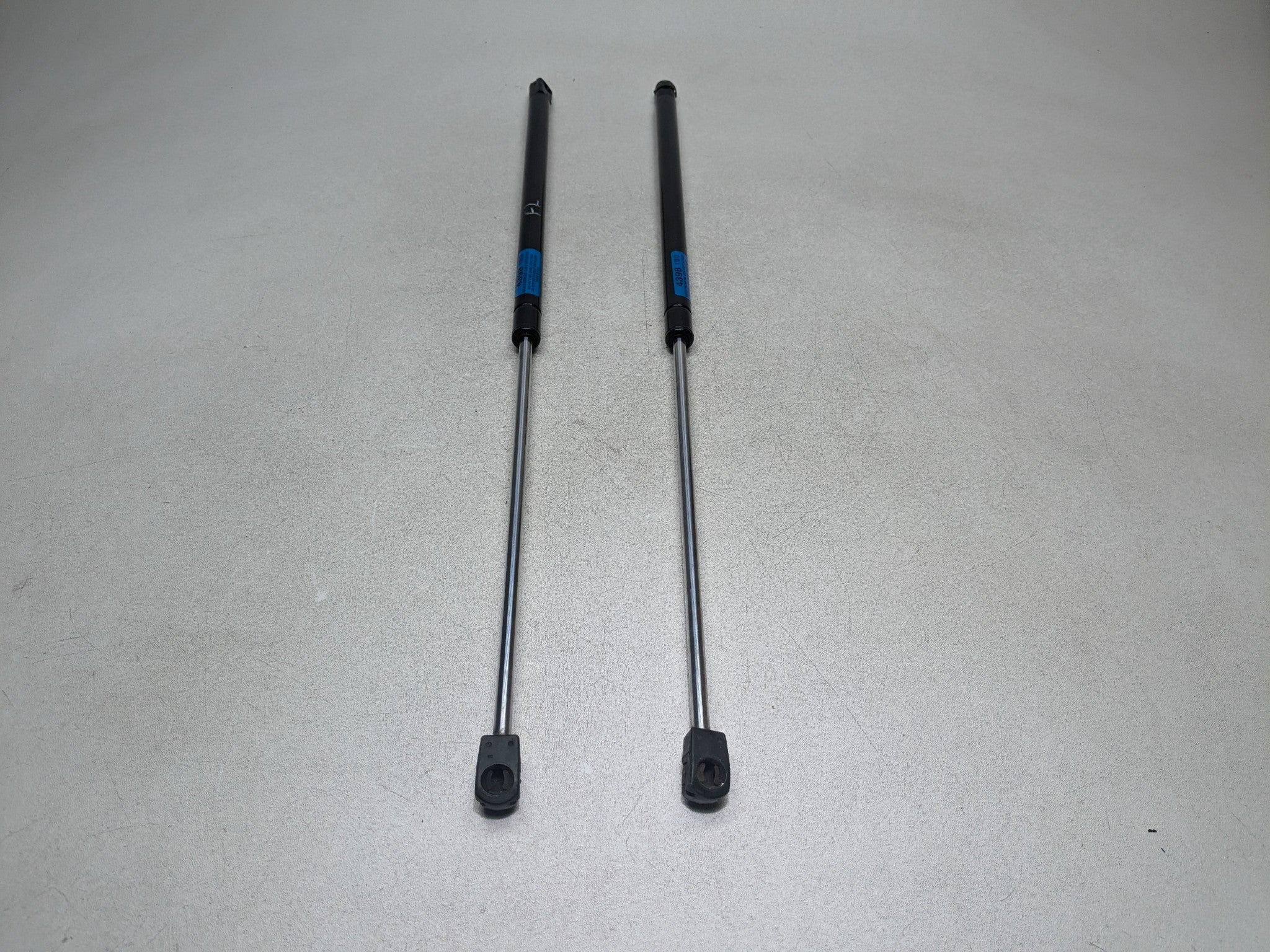 2004 - 2009 CADILLAC SRX OEM HOOD SHOCK STRUT SET OF TWO FRONT LEFT AND RIGHT