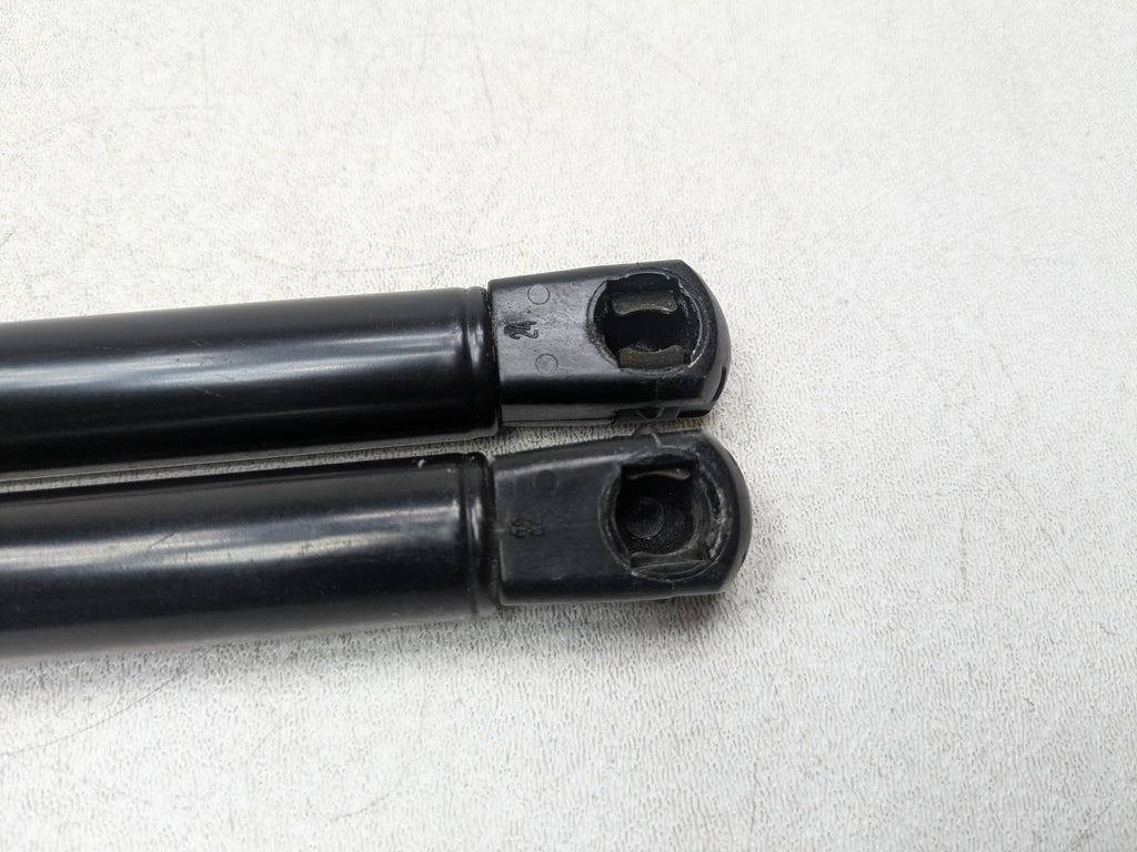 2004 - 2009 CADILLAC SRX OEM HOOD SHOCK STRUT SET OF TWO FRONT LEFT AND RIGHT