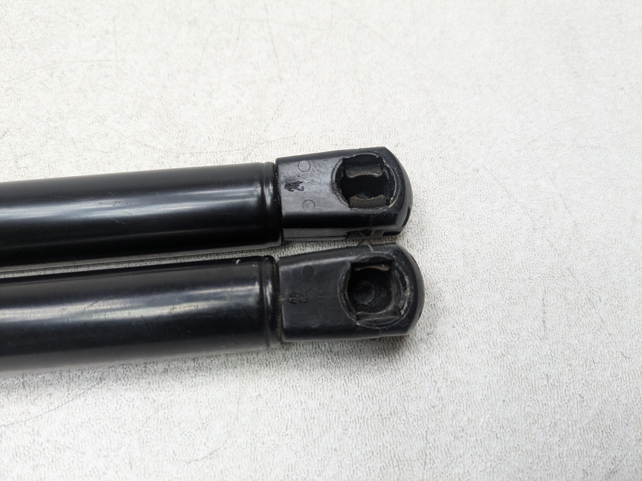 2004 - 2009 CADILLAC SRX OEM HOOD SHOCK STRUT SET OF TWO FRONT LEFT AND RIGHT