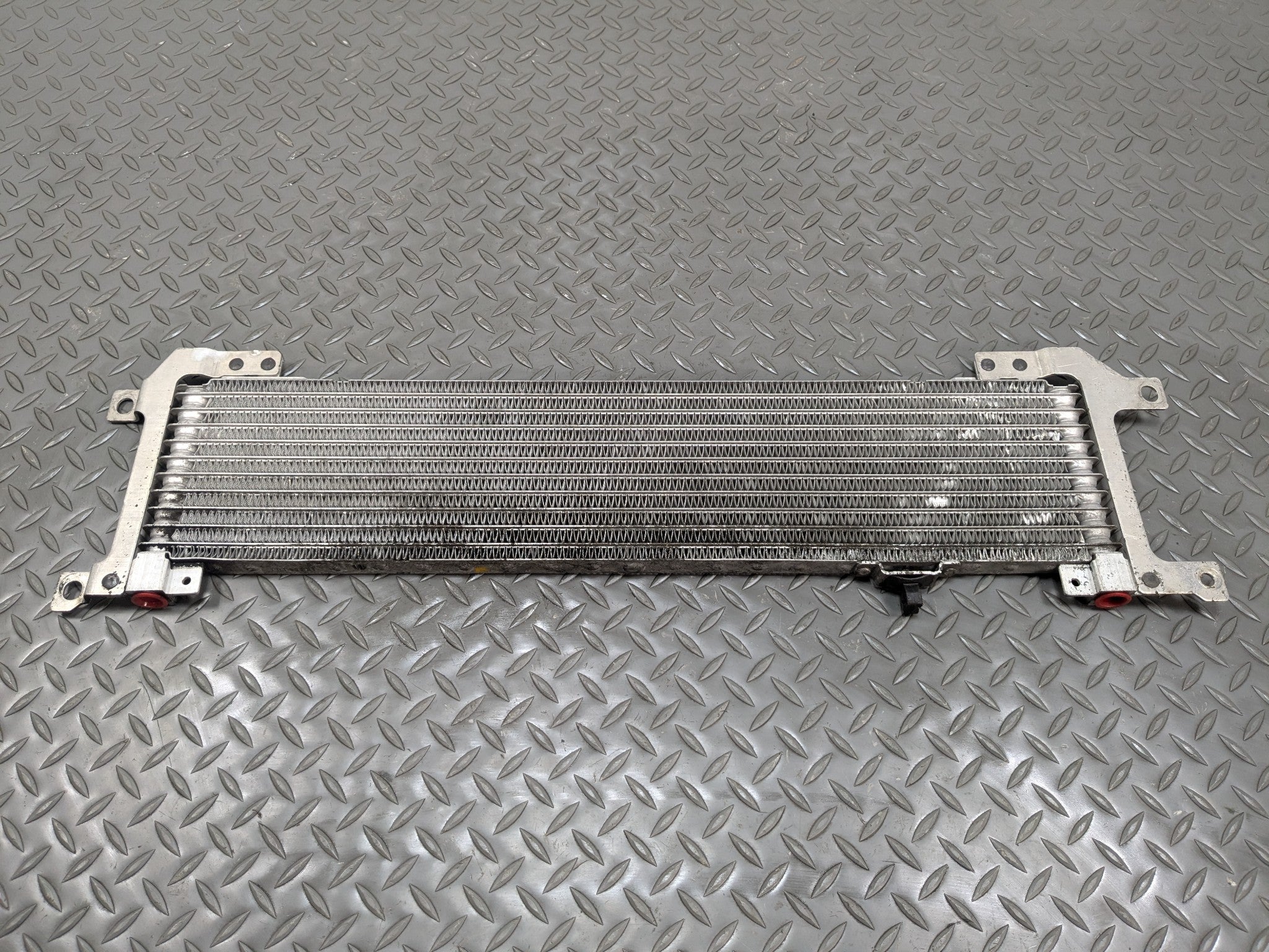 2004 - 2009 CADILLAC SRX OEM TRANSMISSION OIL COOLER RADIATOR ASSEMBLY