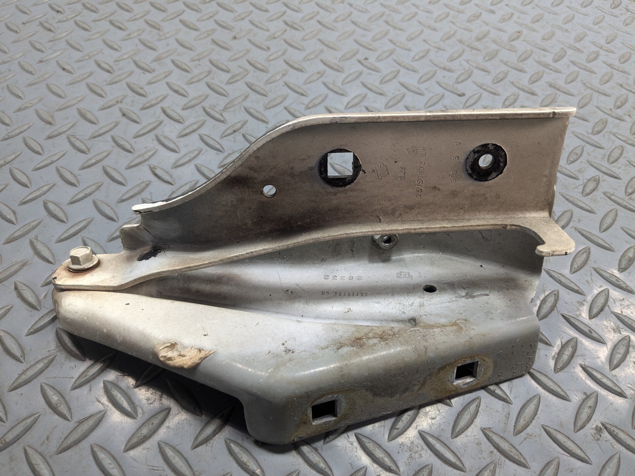 2004 - 2009 CADILLAC SRX OEM HOOD HINGE SUPPORT BRACKET FRONT LEFT DRIVER SIDE