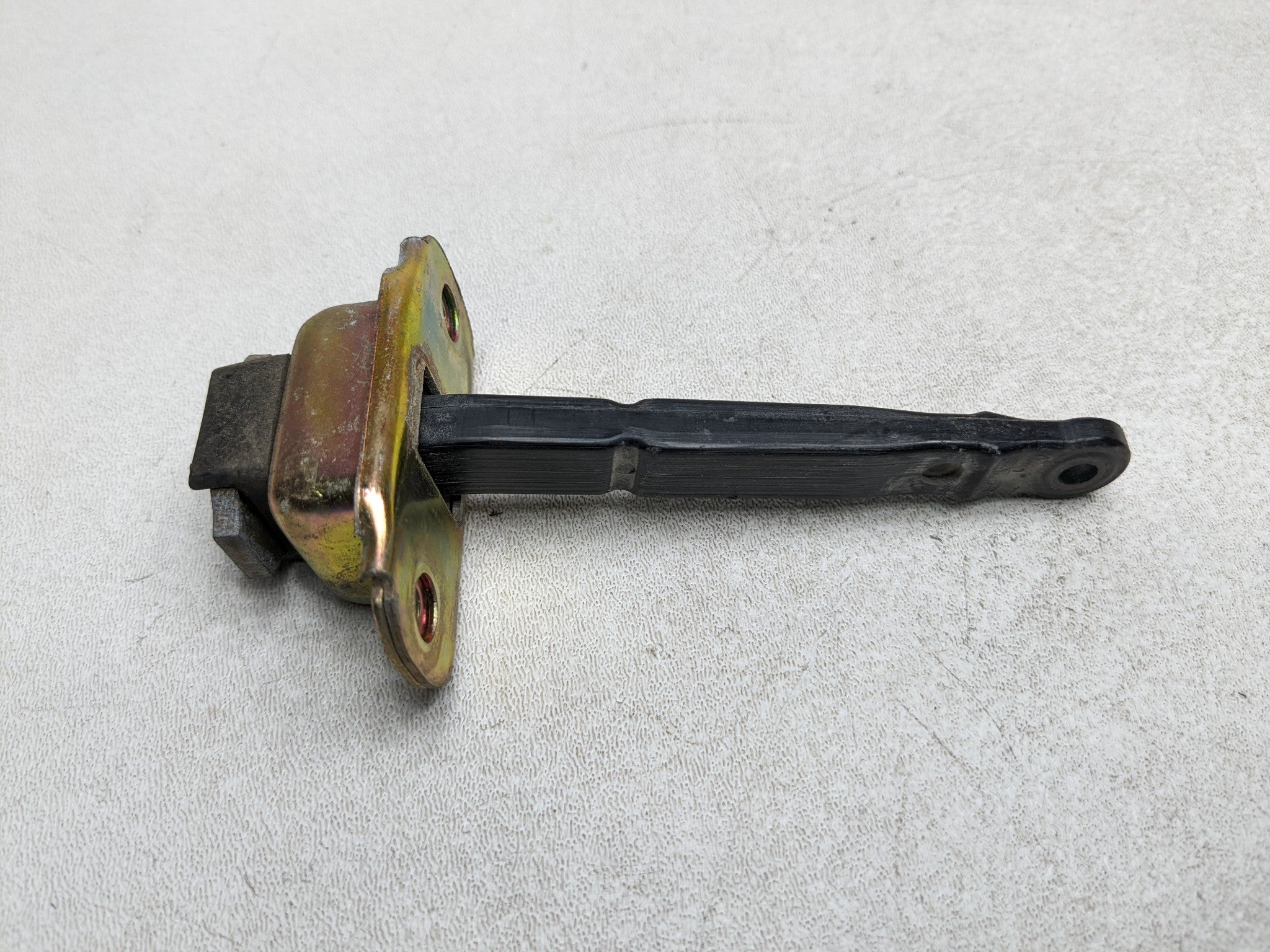 00 - 04 MITSUBISHI MONTERO SPORT OEM DOOR CHECK STRAP STOPPER FRONT LEFT SIDE