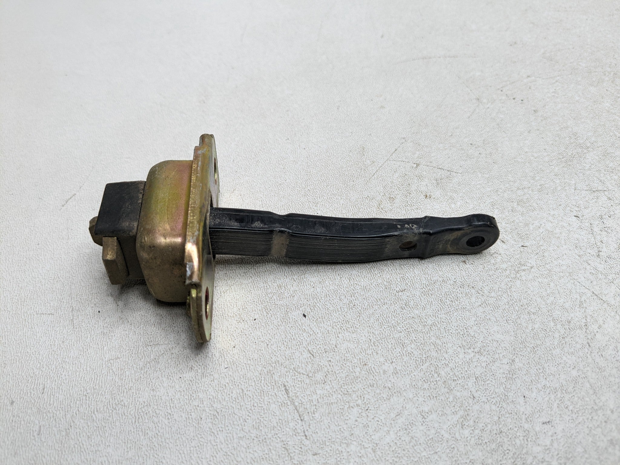 00 - 04 MITSUBISHI MONTERO SPORT OEM DOOR CHECK STRAP STOPPER REAR RIGHT SIDE