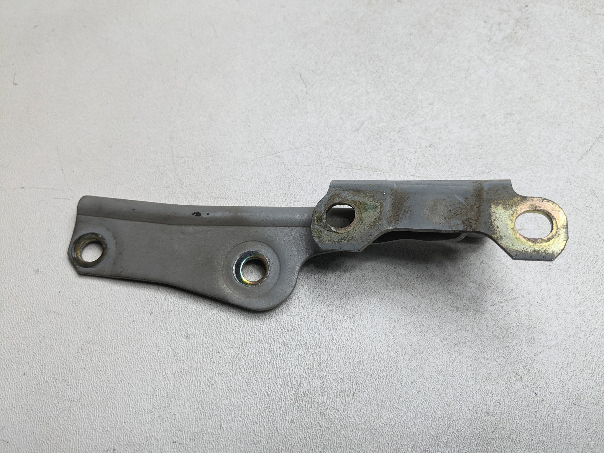 00 - 04 MITSUBISHI MONTERO SPORT OEM HOOD HINGE SUPPORT BRACKET FRONT LEFT SIDE