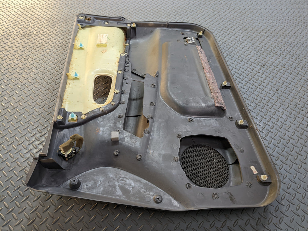 00 - 04 MITSUBISHI MONTERO SPORT OEM INTERIOR DOOR TRIM PANEL FRONT LEFT SIDE