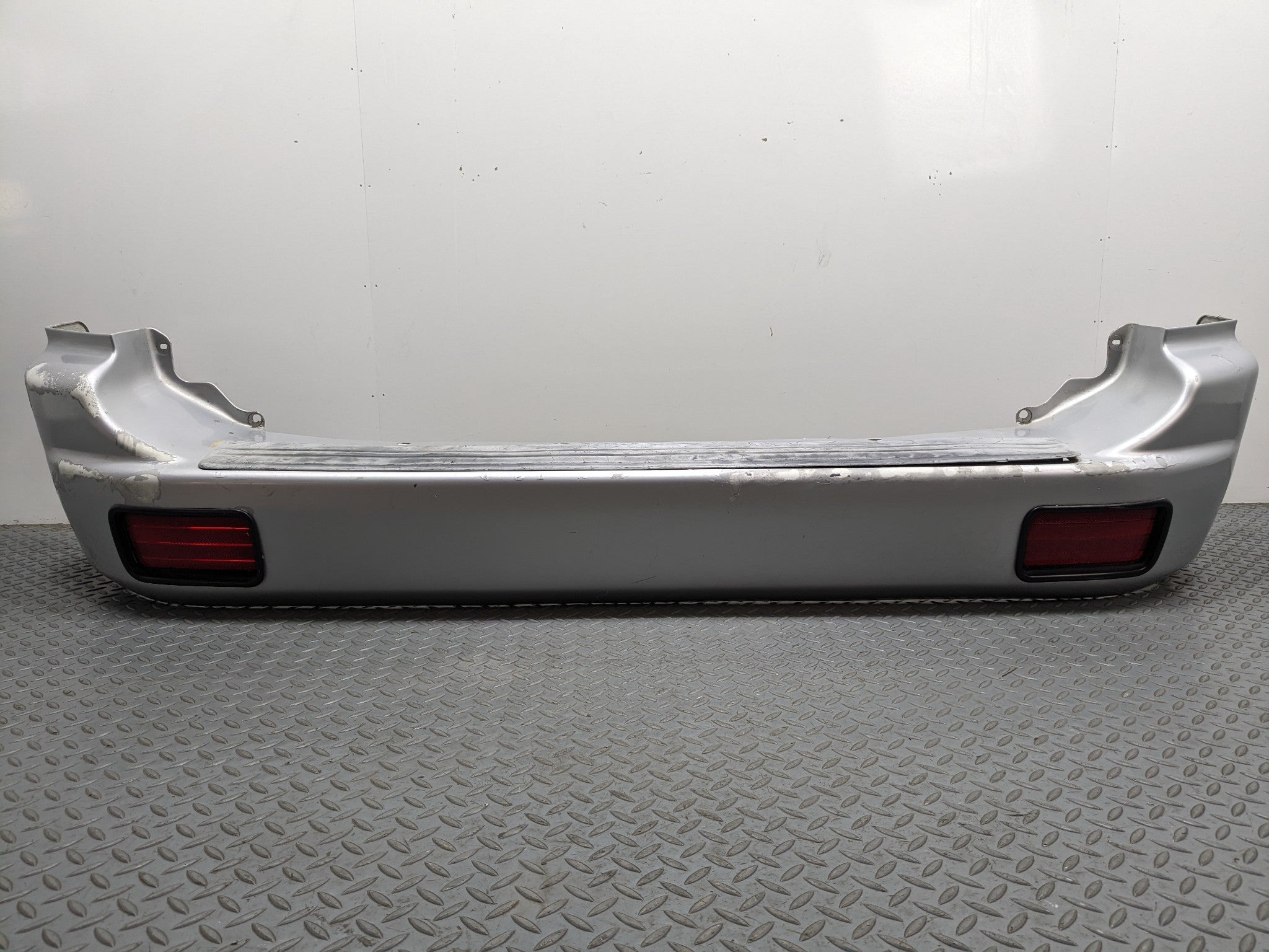 00 – 04 MITSUBISHI MONTERO SPORT OEM REAR BUMPER LOWER COVER PANEL SILVER GRAY