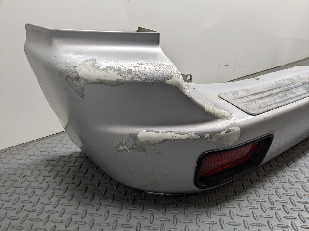 00 – 04 MITSUBISHI MONTERO SPORT OEM REAR BUMPER LOWER COVER PANEL SILVER GRAY
