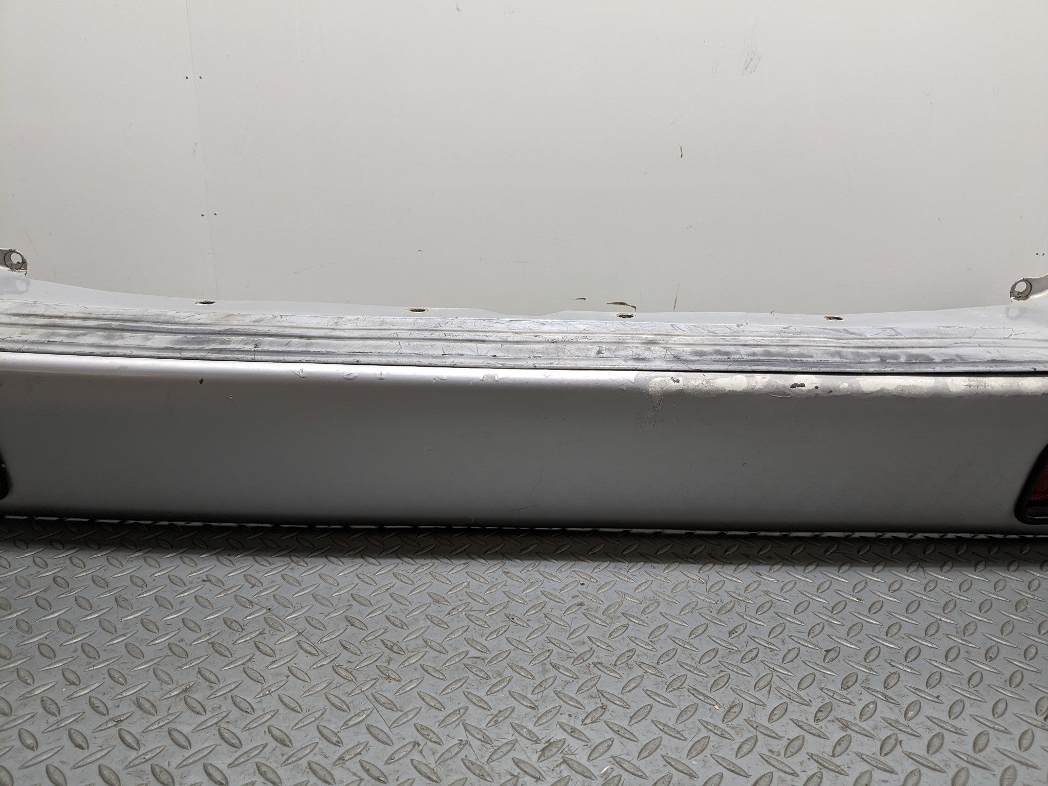 00 – 04 MITSUBISHI MONTERO SPORT OEM REAR BUMPER LOWER COVER PANEL SILVER GRAY