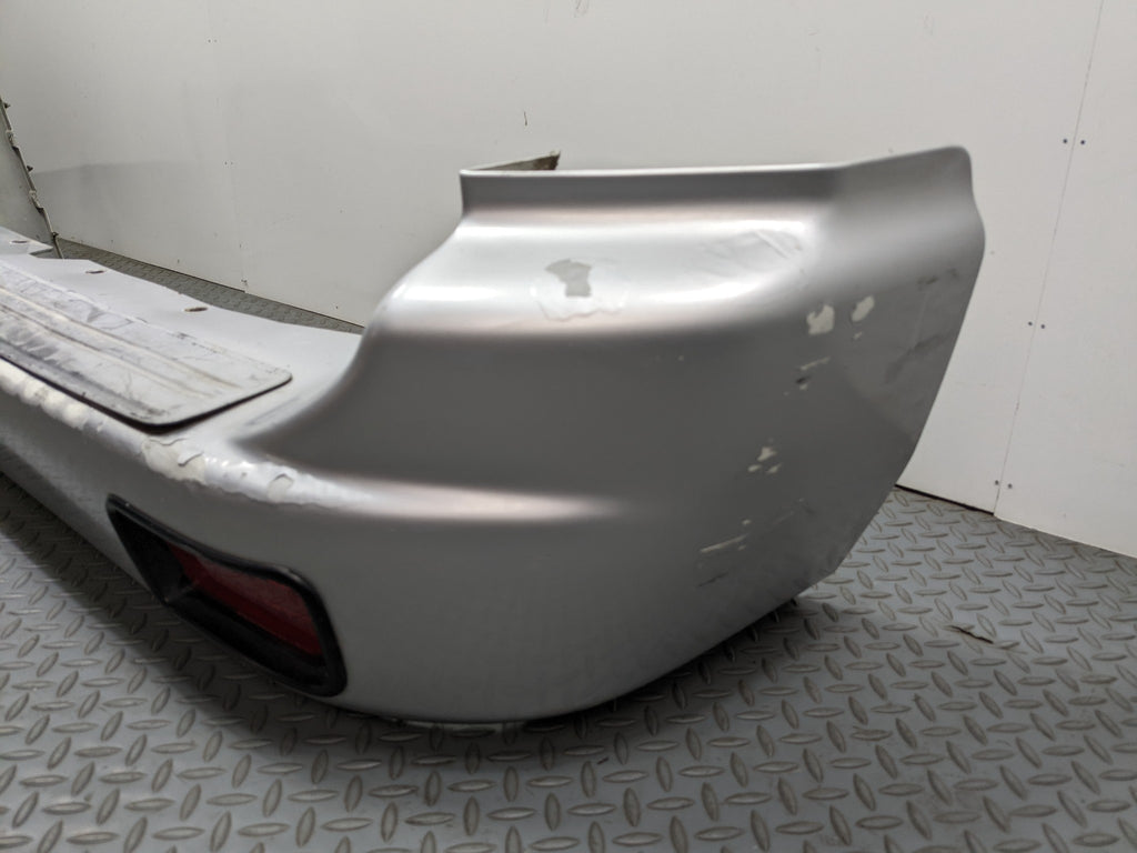 00 – 04 MITSUBISHI MONTERO SPORT OEM REAR BUMPER LOWER COVER PANEL SILVER GRAY