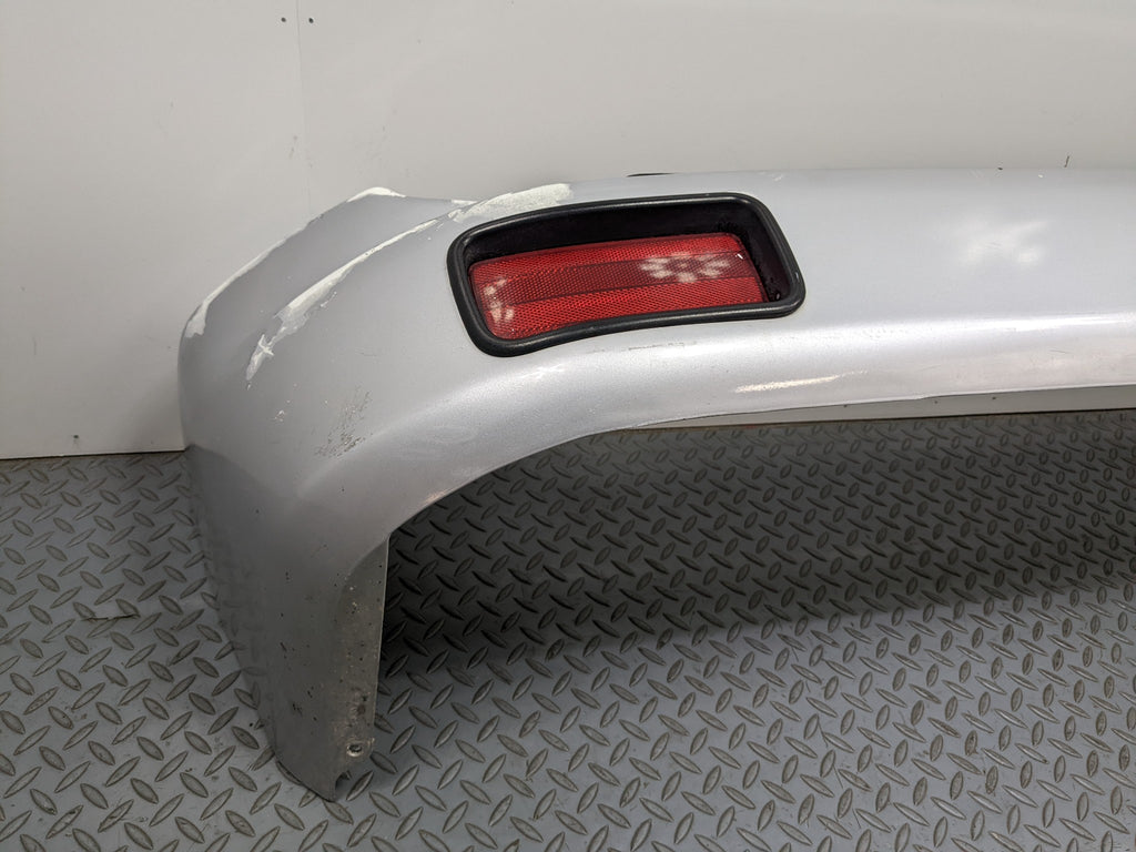 00 – 04 MITSUBISHI MONTERO SPORT OEM REAR BUMPER LOWER COVER PANEL SILVER GRAY