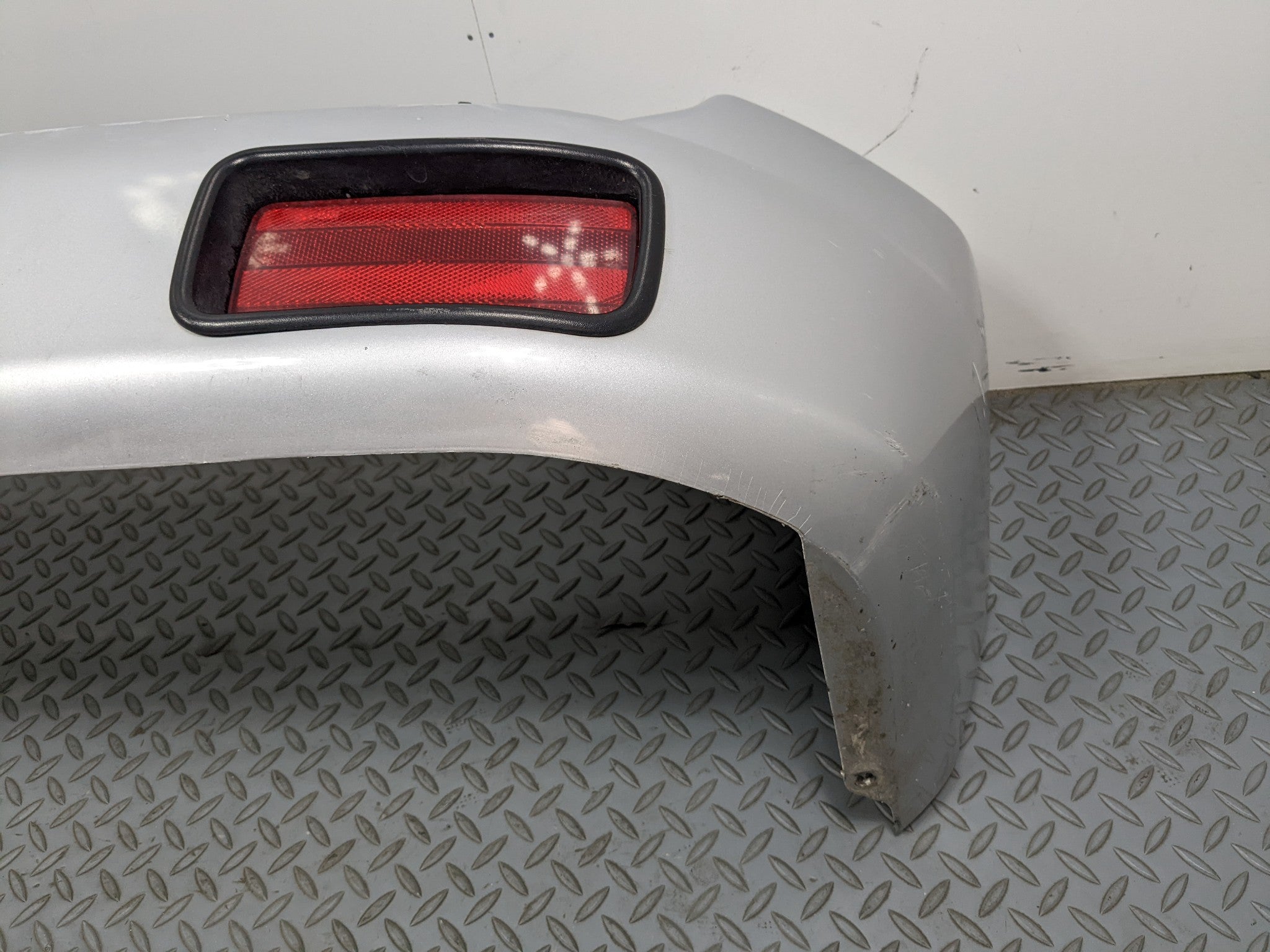 00 – 04 MITSUBISHI MONTERO SPORT OEM REAR BUMPER LOWER COVER PANEL SILVER GRAY