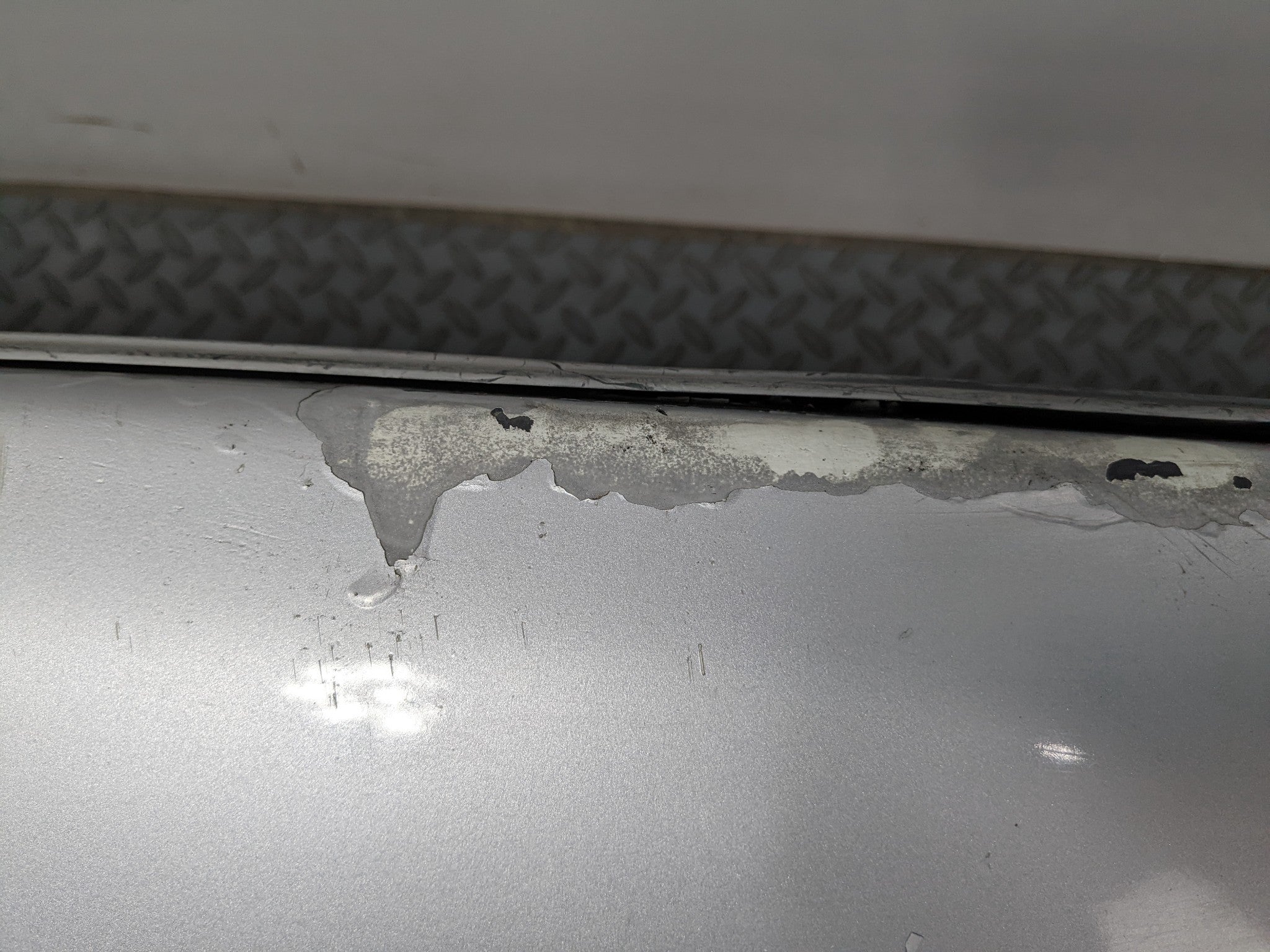 00 – 04 MITSUBISHI MONTERO SPORT OEM REAR BUMPER LOWER COVER PANEL SILVER GRAY