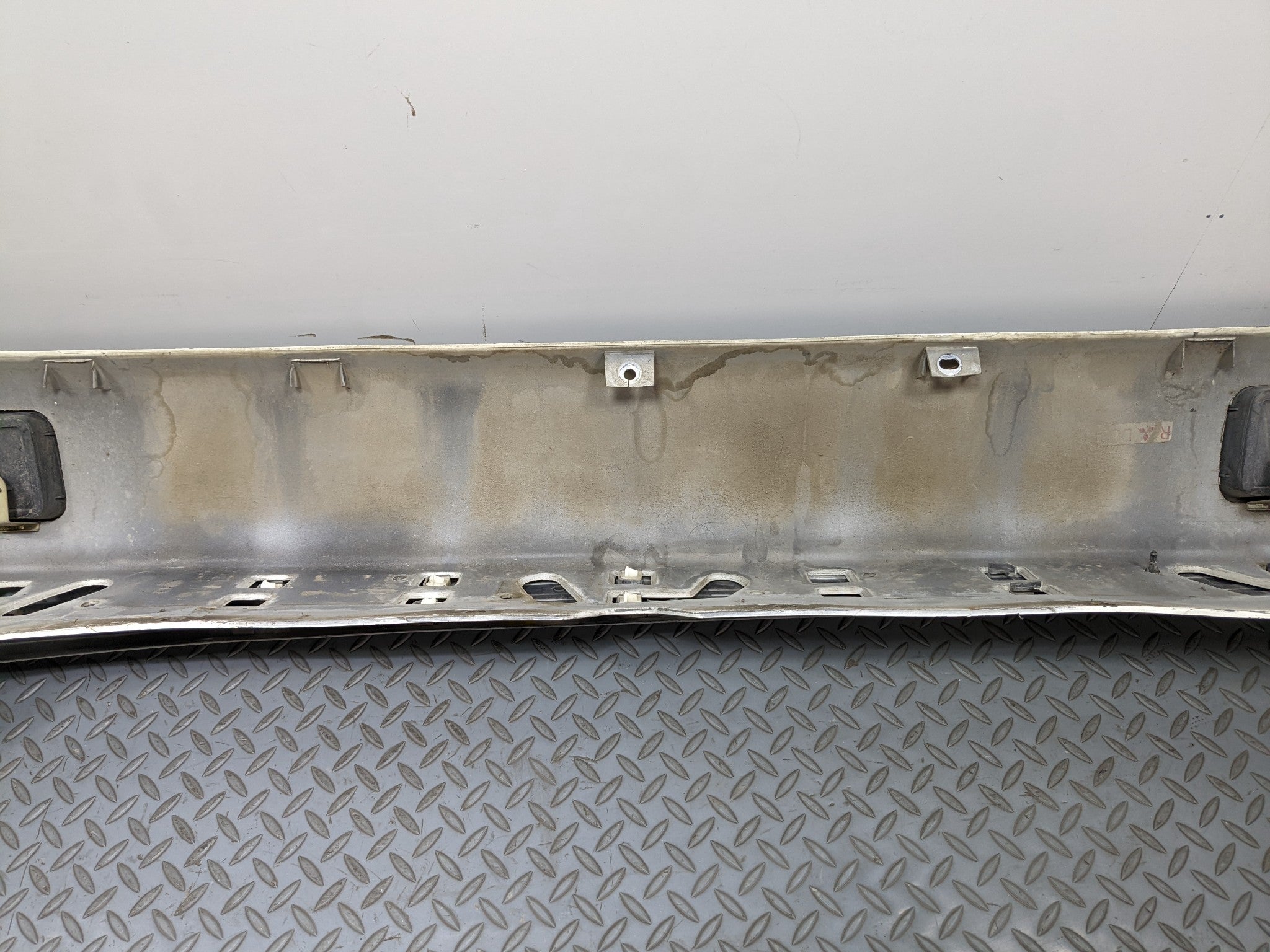 00 – 04 MITSUBISHI MONTERO SPORT OEM REAR BUMPER LOWER COVER PANEL SILVER GRAY