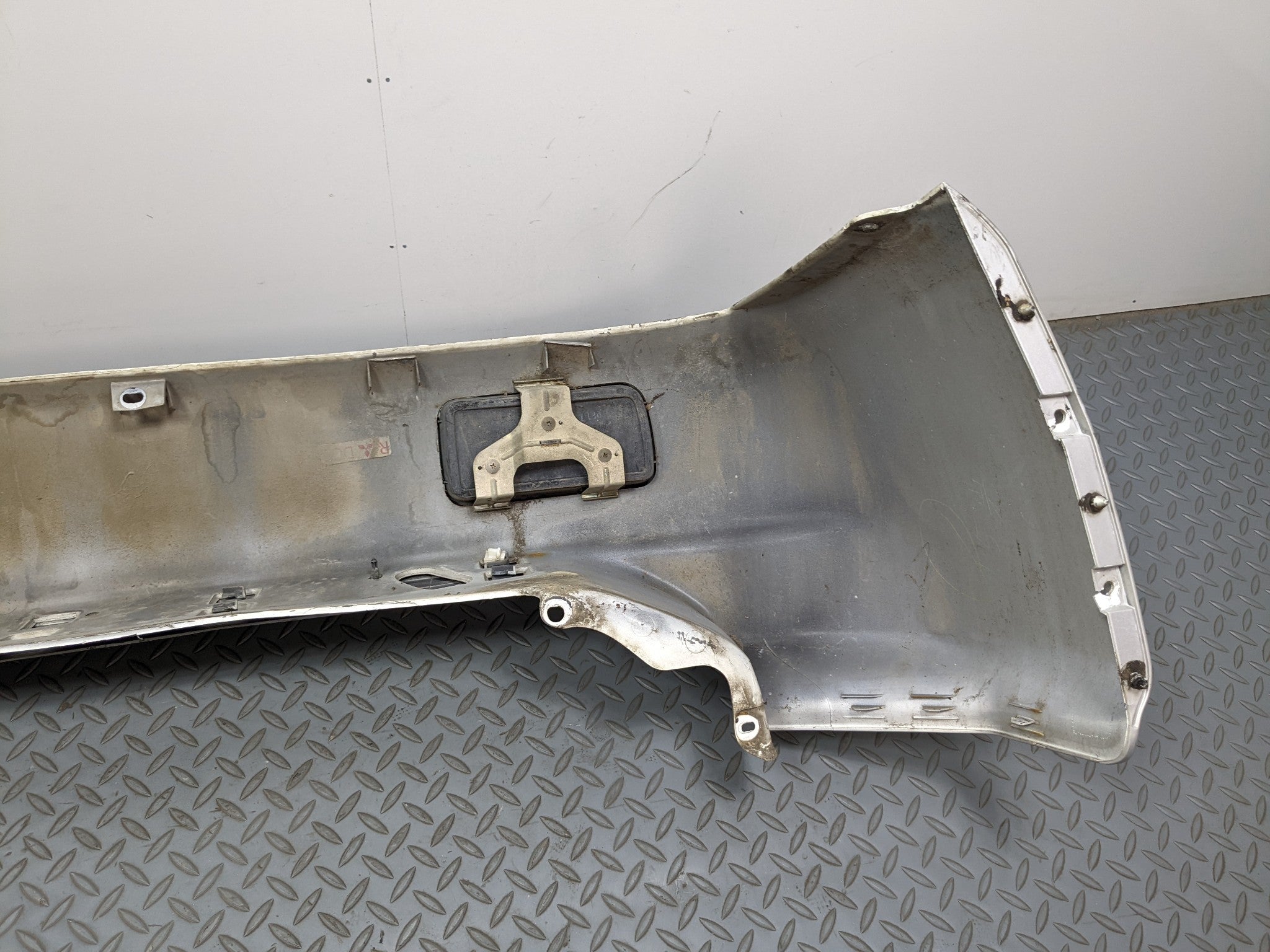 00 – 04 MITSUBISHI MONTERO SPORT OEM REAR BUMPER LOWER COVER PANEL SILVER GRAY