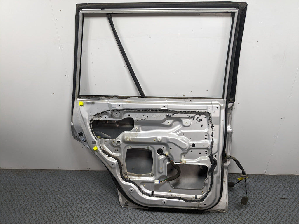 00 – 04 MITSUBISHI MONTERO SPORT OEM DOOR SHELL PANEL SILVER GRAY REAR LEFT