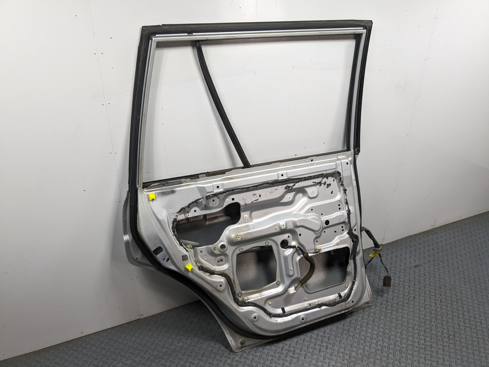 00 – 04 MITSUBISHI MONTERO SPORT OEM DOOR SHELL PANEL SILVER GRAY REAR LEFT