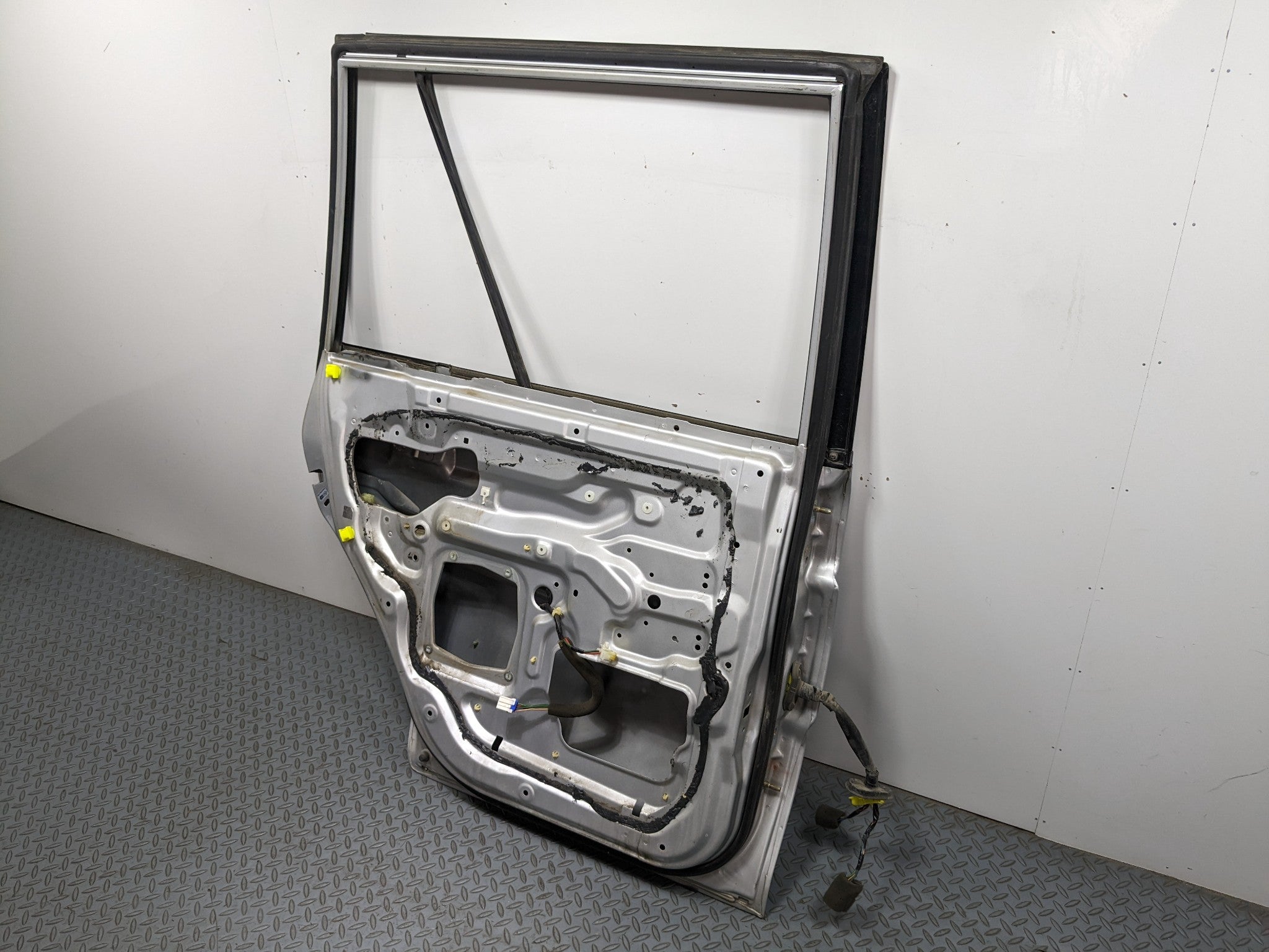 00 – 04 MITSUBISHI MONTERO SPORT OEM DOOR SHELL PANEL SILVER GRAY REAR LEFT