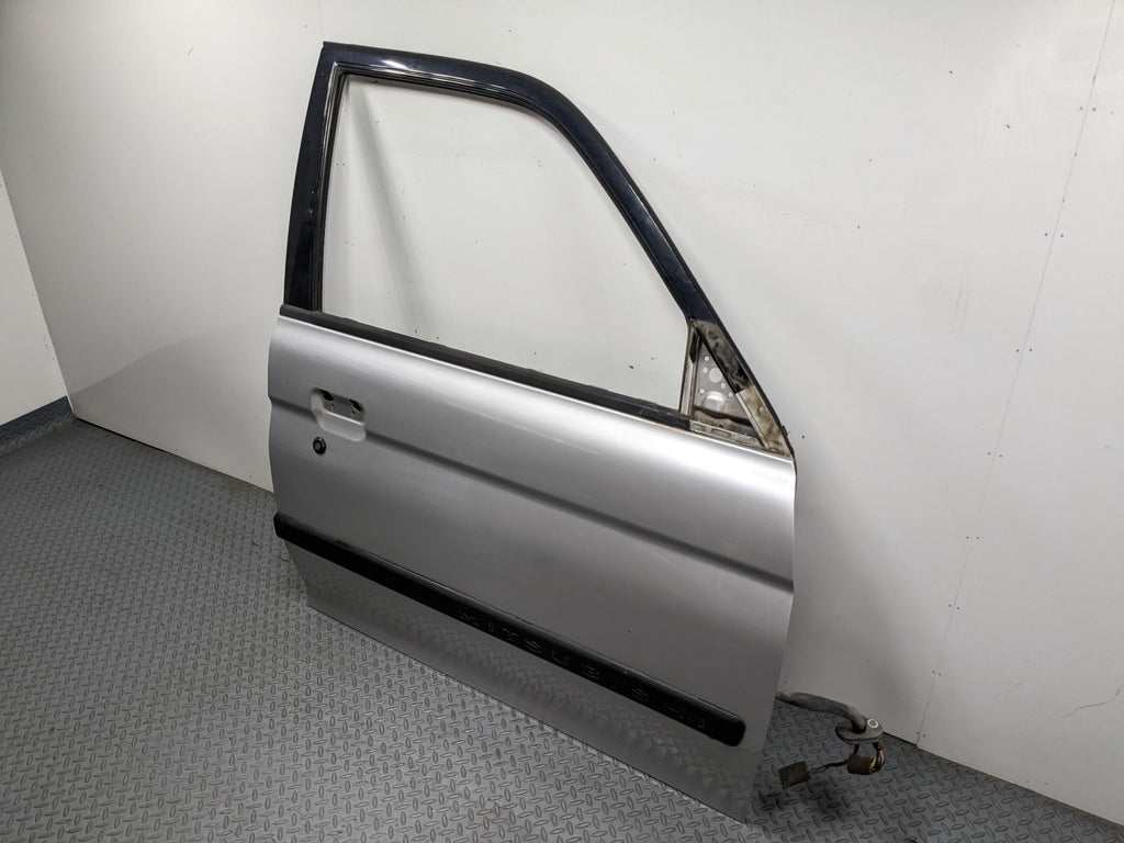 00 – 04 MITSUBISHI MONTERO SPORT OEM DOOR SHELL PANEL SILVER GRAY FRONT RIGHT