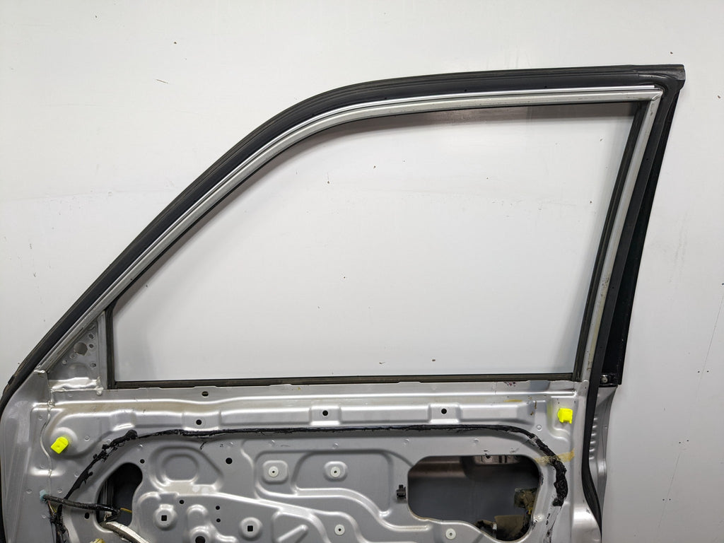 00 – 04 MITSUBISHI MONTERO SPORT OEM DOOR SHELL PANEL SILVER GRAY FRONT RIGHT