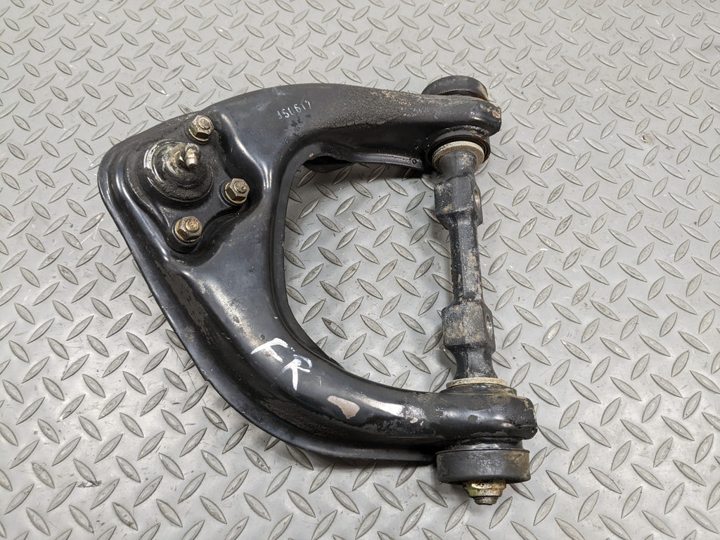 00 - 04 MITSUBISHI MONTERO SPORT OEM UPPER SUSPENSION CONTROL ARM FRONT RIGHT