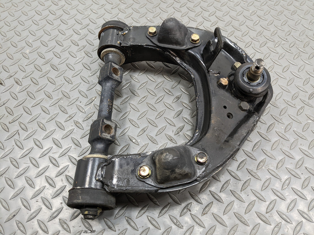 00 - 04 MITSUBISHI MONTERO SPORT OEM UPPER SUSPENSION CONTROL ARM FRONT RIGHT